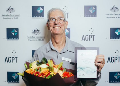 Dr John Vaughan receiving the Supervisor of the Year Award (North Coast) in 2017 