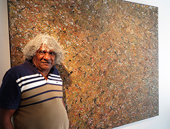 Bundjalung artist Digby Moran with Lismore Flood, one of the highlights of his recent ‘Growing up on the Island’ exhibition at Lismore Regional Gallery.