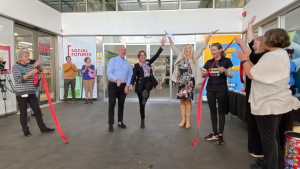Cutting the ribbon at the official re-launch of the Lismore Liver Clinic were Steven Drew, CE of Hepatitis NSW, and Dr Valerie Delpech, Acting Director North Coast Population and Public Health, and the MC for the event, well-known local comedian and writer, Many Nolan.